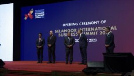 May be an image of 5 people, lighting, dais and text